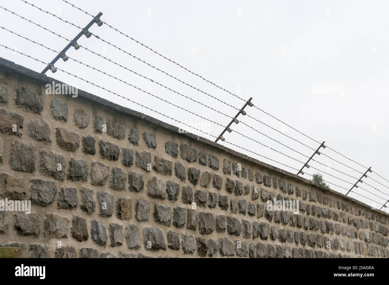Austria, Mauthausen, Mauthausen Memorial Jewish concentration camp, electrified fence, liberated by US Army in 1945 Stock Photo