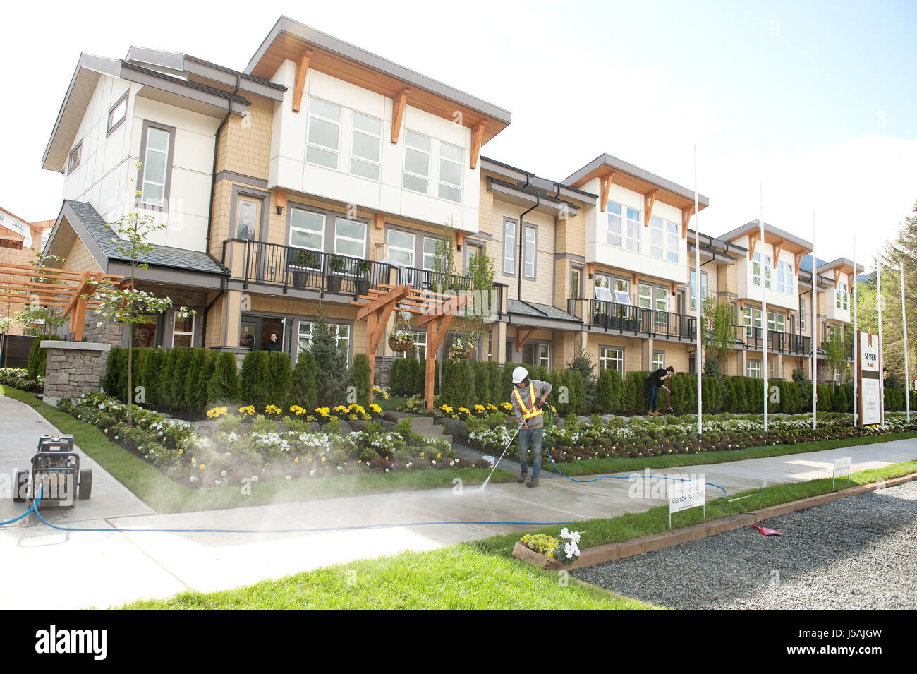 A worker puts the finishing touches on the seven peaks condominium