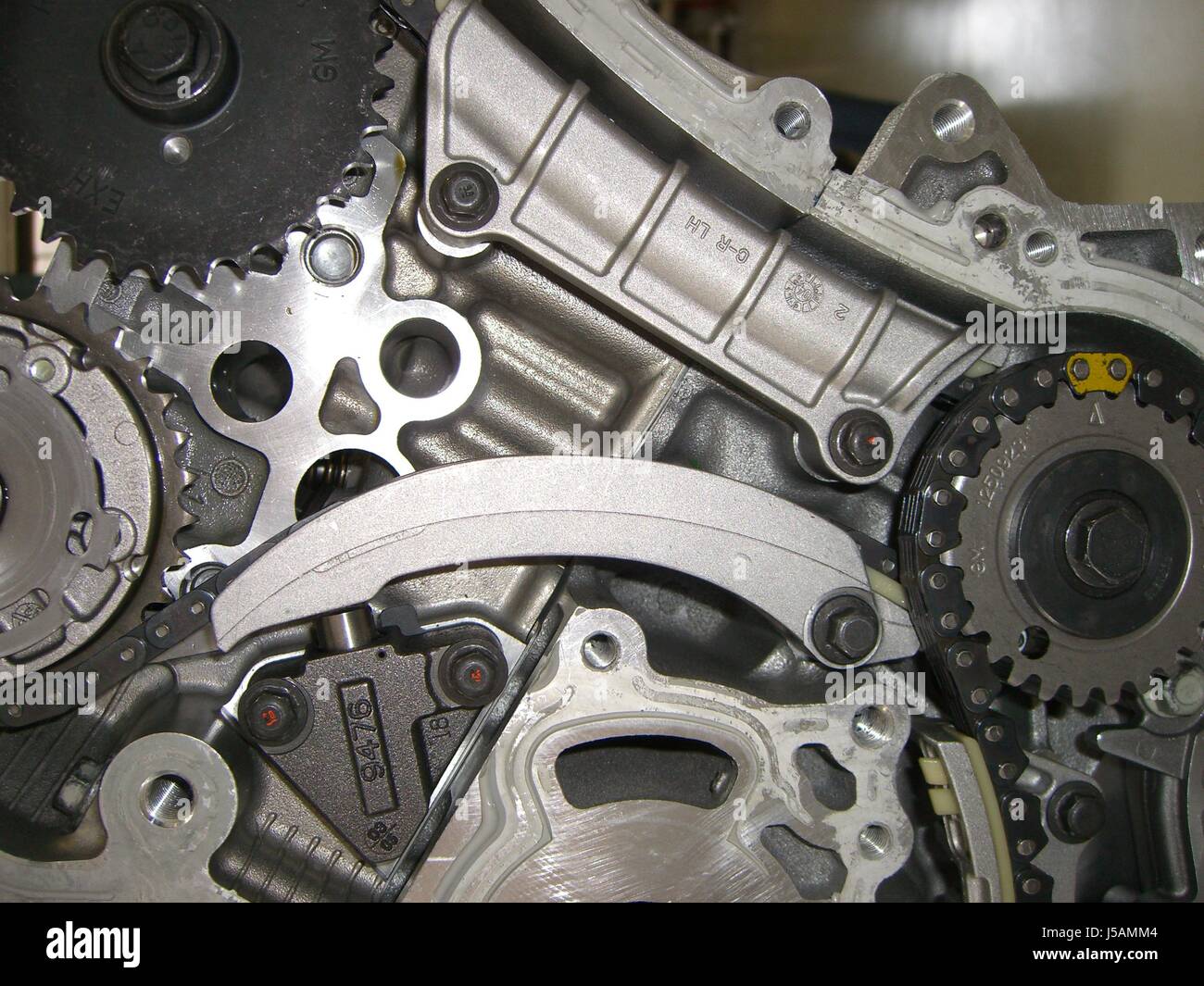 engineering engine drive motor chain screw gear wheels aluminum aluminium  Stock Photo - Alamy