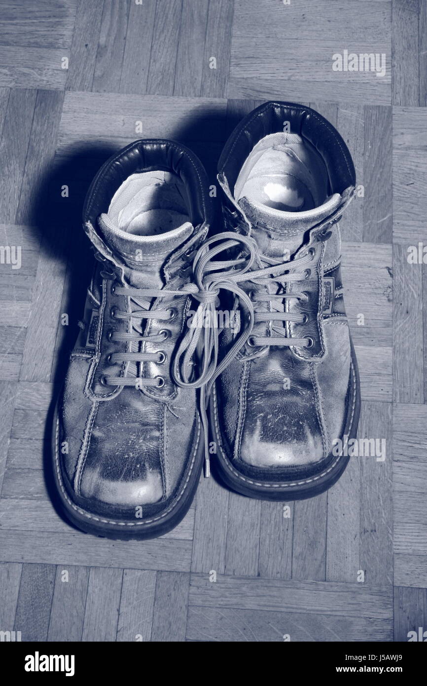 leather sole shoelace timber flooring assigned protective cover shank shoe Stock Photo