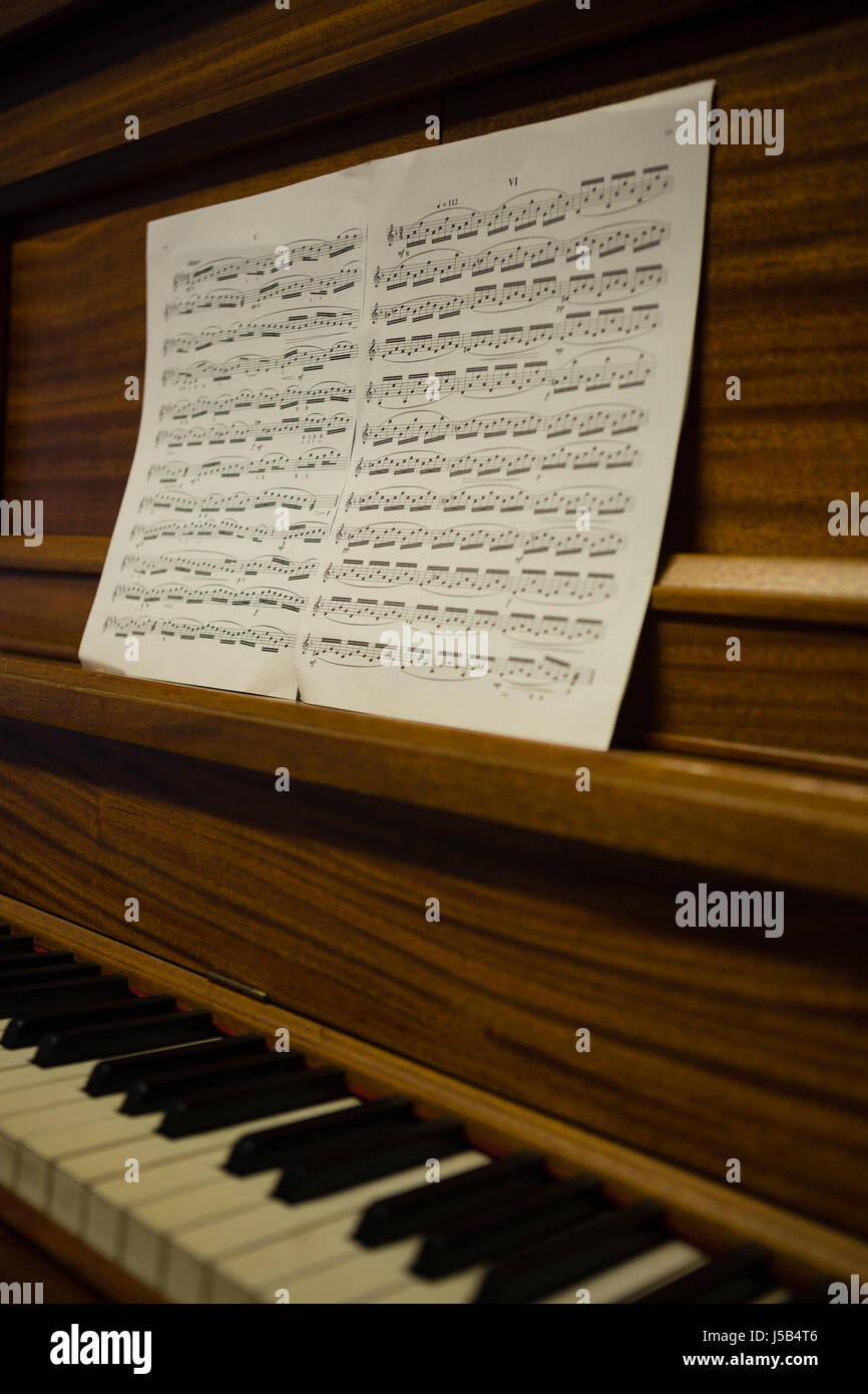 Close up of sheet music on piano in school Stock Photo - Alamy