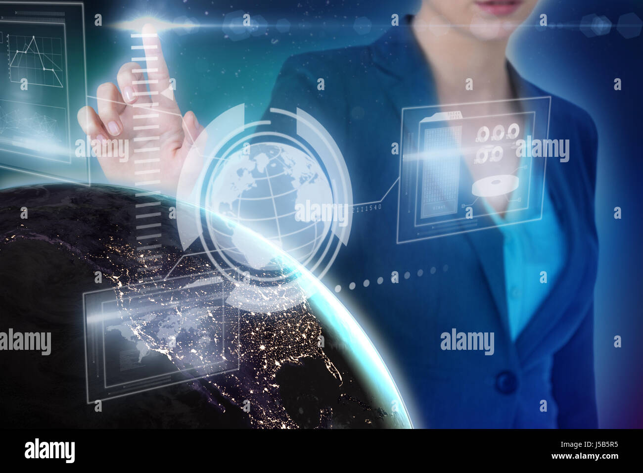 Cropped image of businesswoman using imaginative digital screen against blue background with vignette Stock Photo