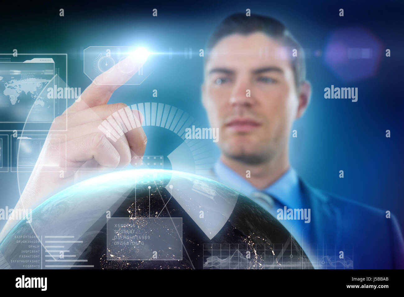 Businessman touching digital screen against blue background with vignette Stock Photo
