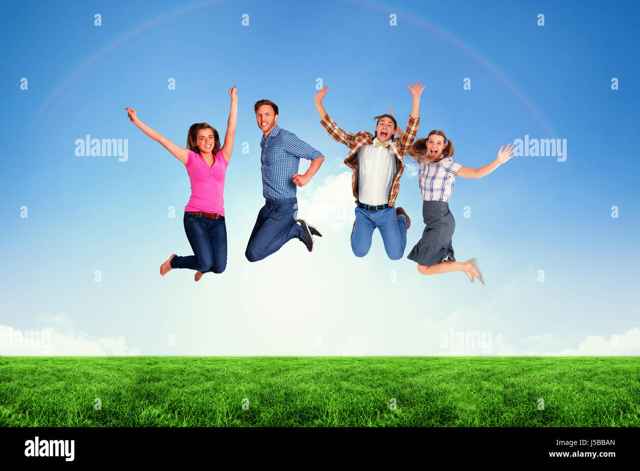 Full length of friends jumping against blue sky with clouds Stock Photo ...