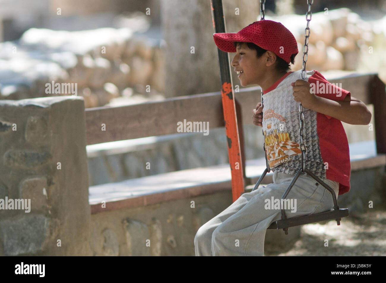 Aboriginal kid in a park. Cachi, Salta province, Argentina Stock Photo