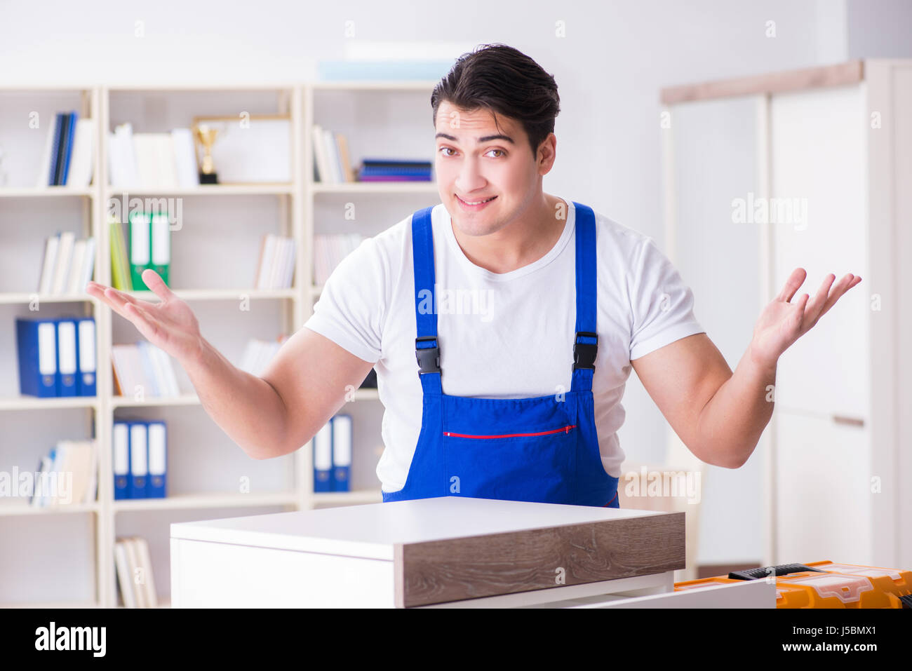 Furniture repair and assembly concept Stock Photo Alamy