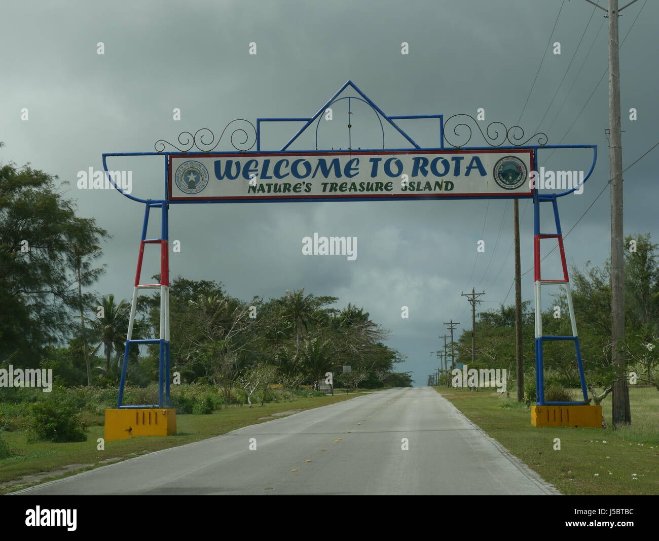 Welcome to Rota, Northern Mariana Islands Welcome gate to Rota just a few meters away from the Rota International Airport. Stock Photo