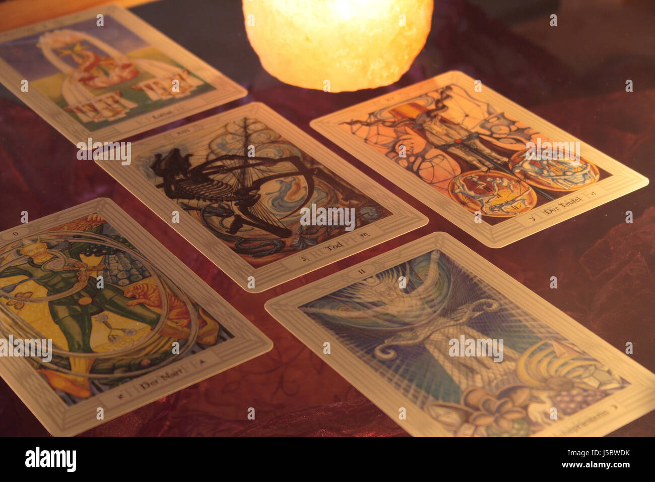 esoteric tarot cards candlelight Stock Photo
