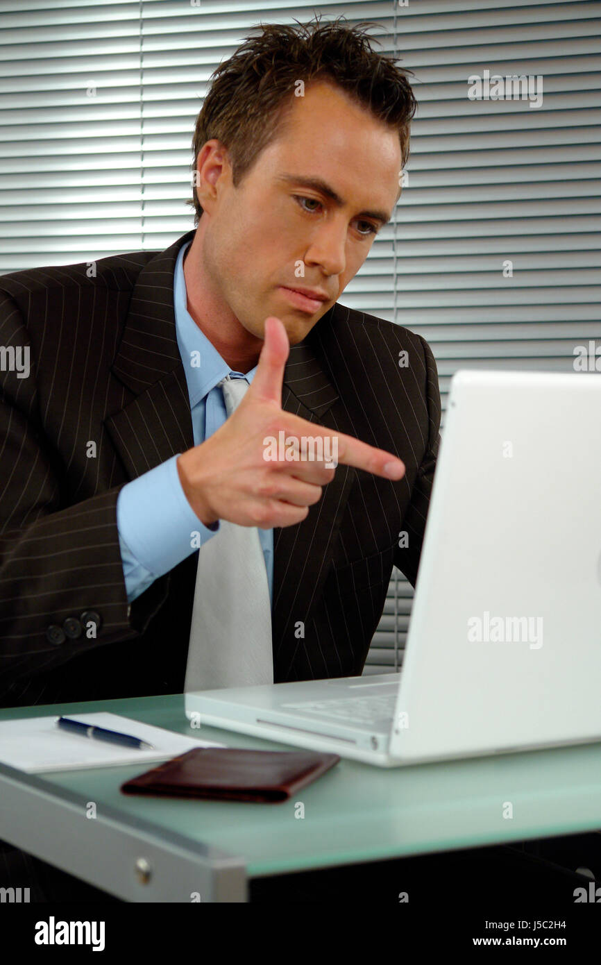 office laptop notebook computers computer extortion blackmail consultation Stock Photo
