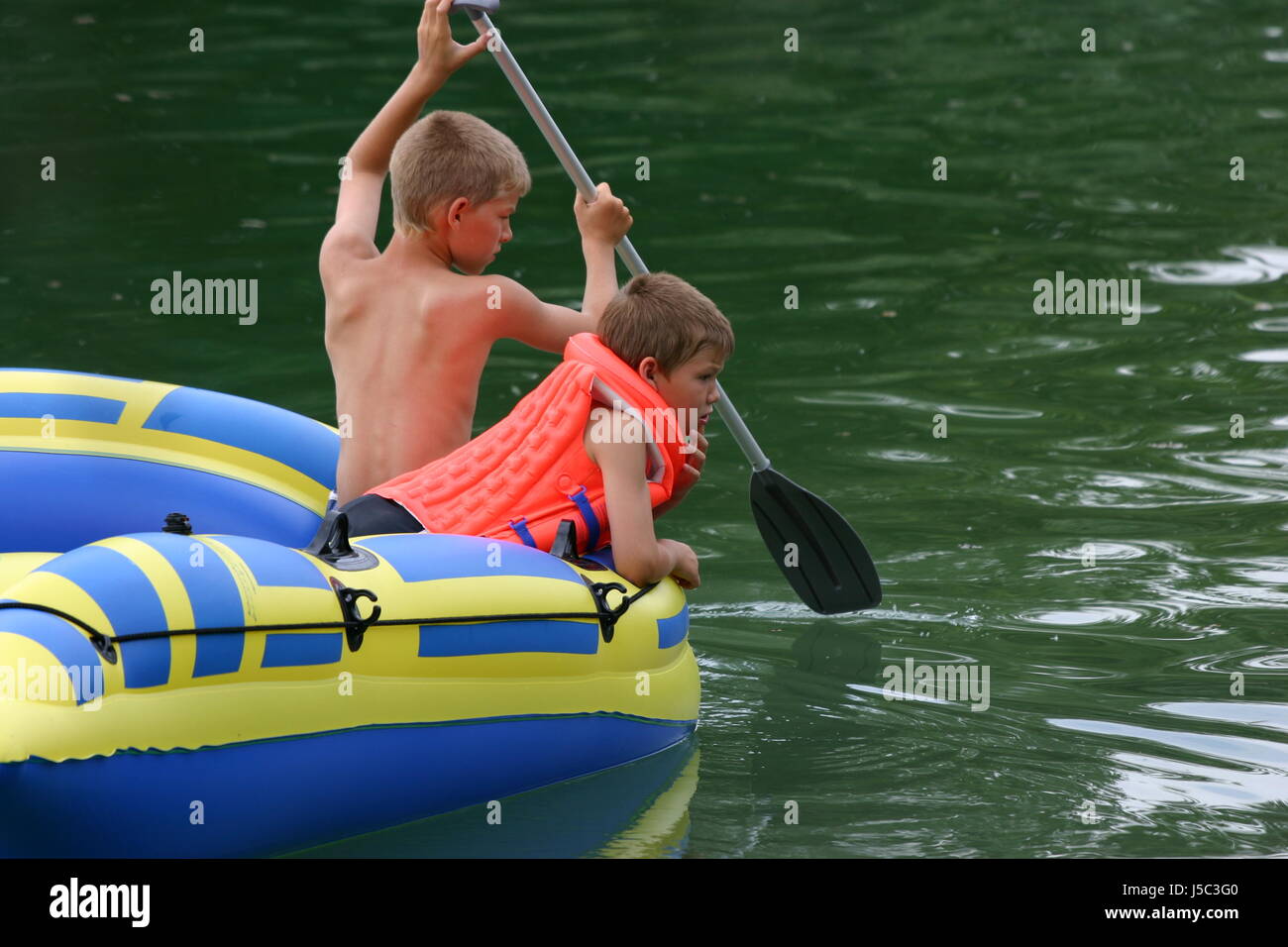 Rubber dinghy kids hires stock photography and images Alamy