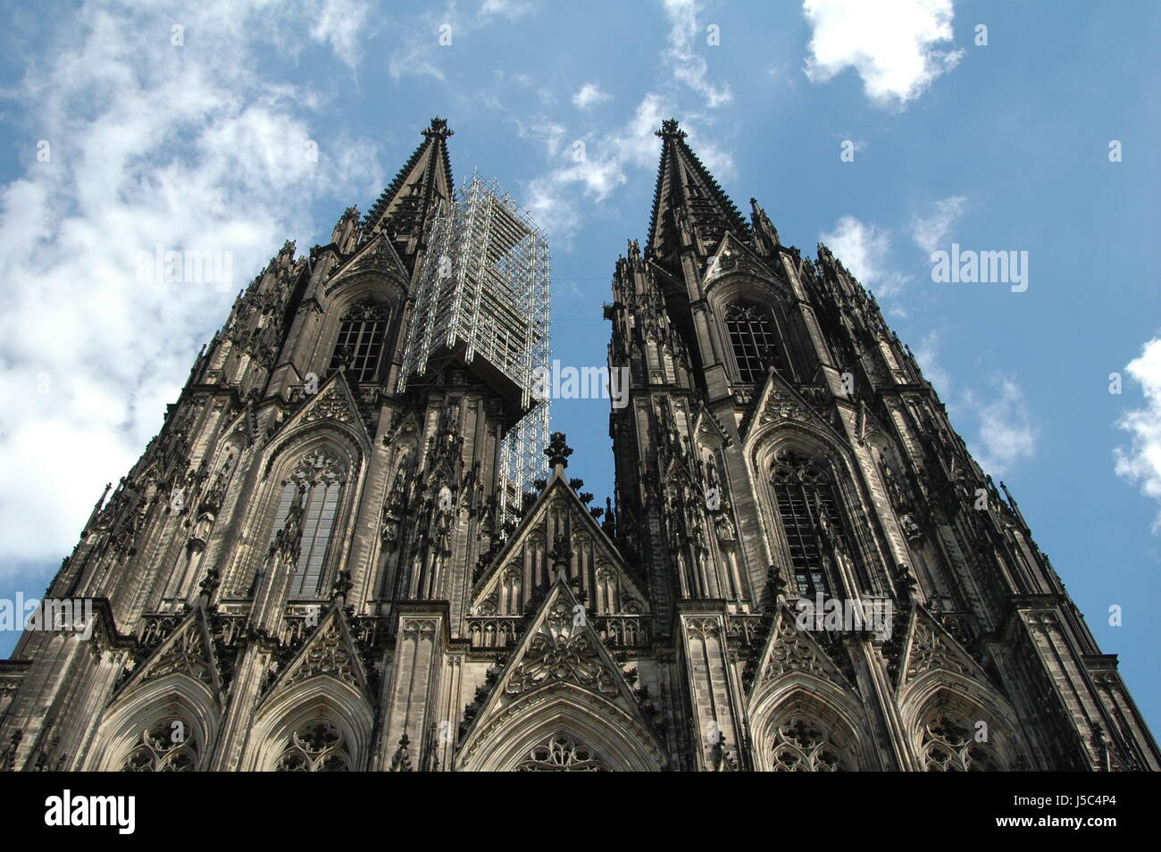 historical church cologne cathedral towers scaffold scaffolding detail view Stock Photo