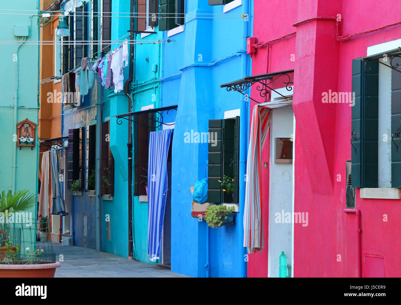 Colorful houses on the island of Burano near Venice in Italy in summer ...