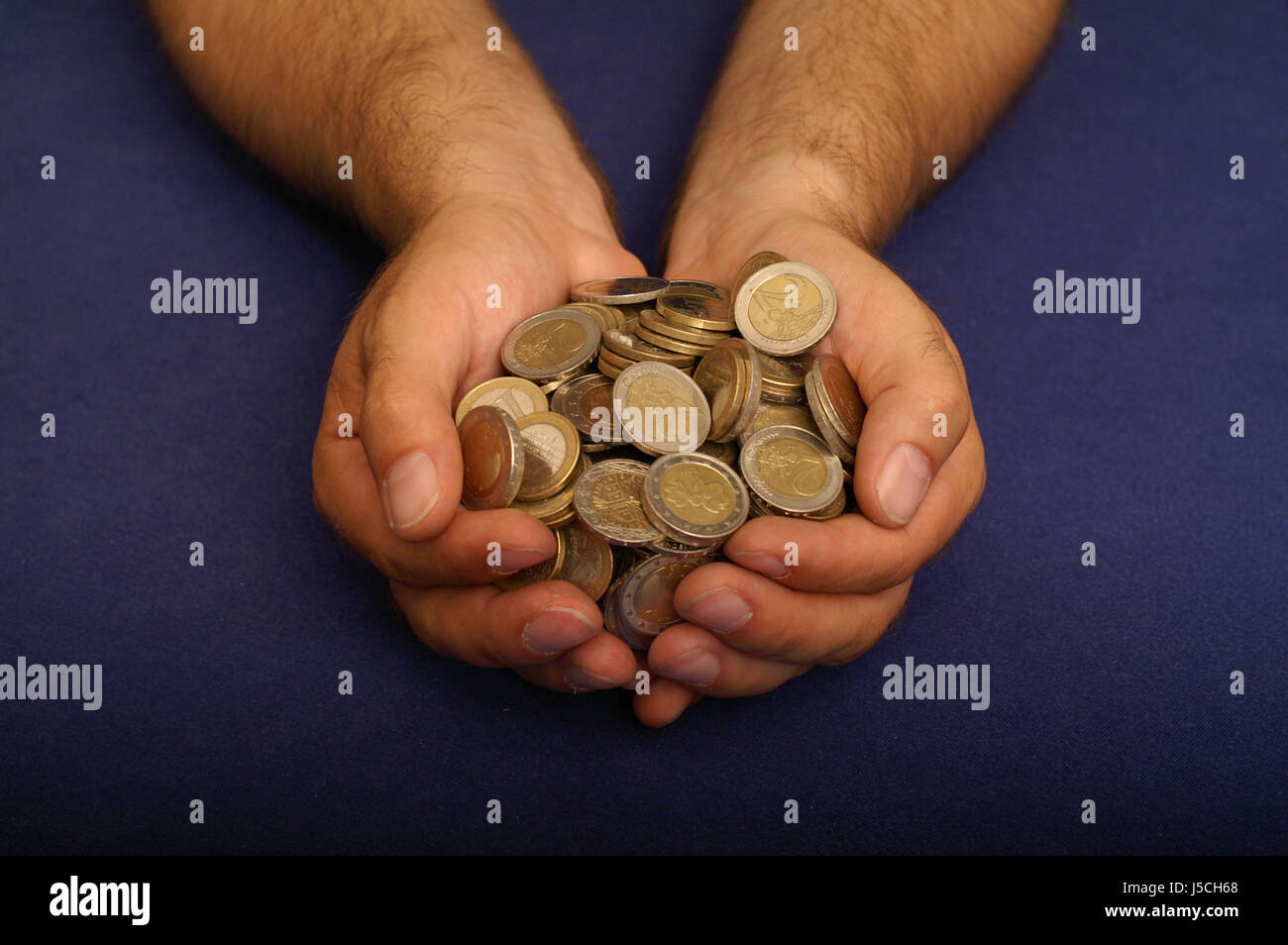 hand full of money Stock Photo
