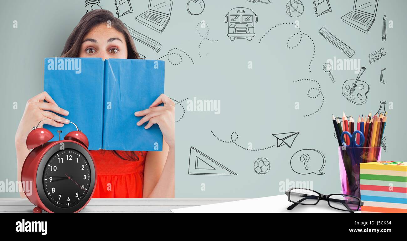 Digital composite of Female student holding book in front of face ...