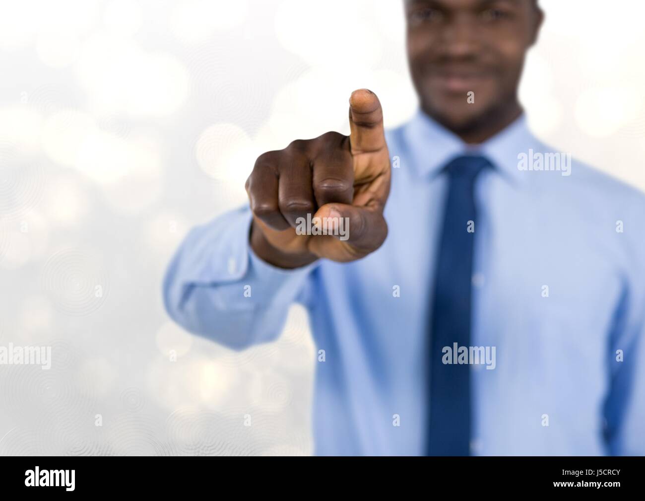 Digital composite of Businessman pointing with focus on hand Stock ...