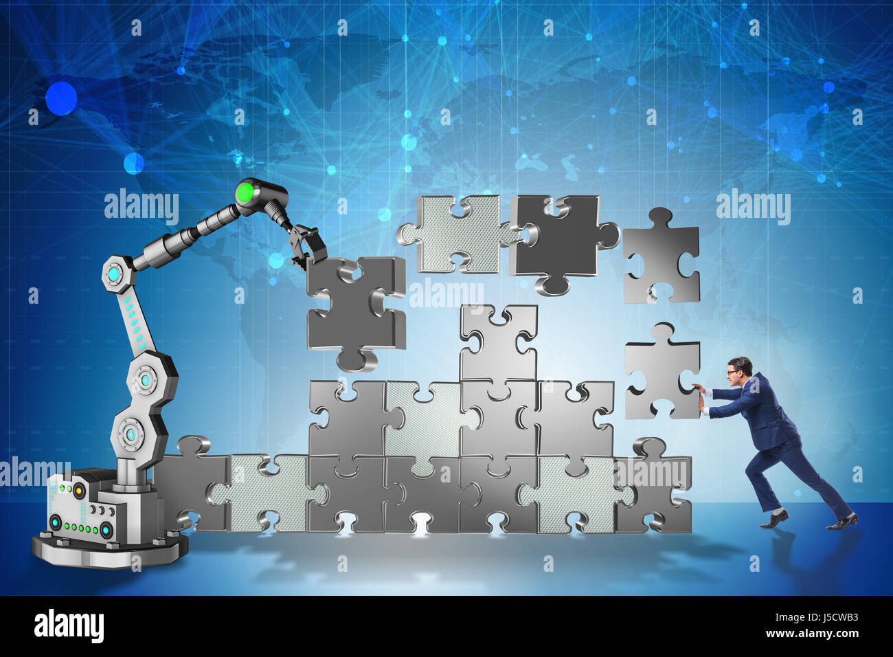 Businessman doing jigsaw puzzle with robotic arm Stock Photo - Alamy
