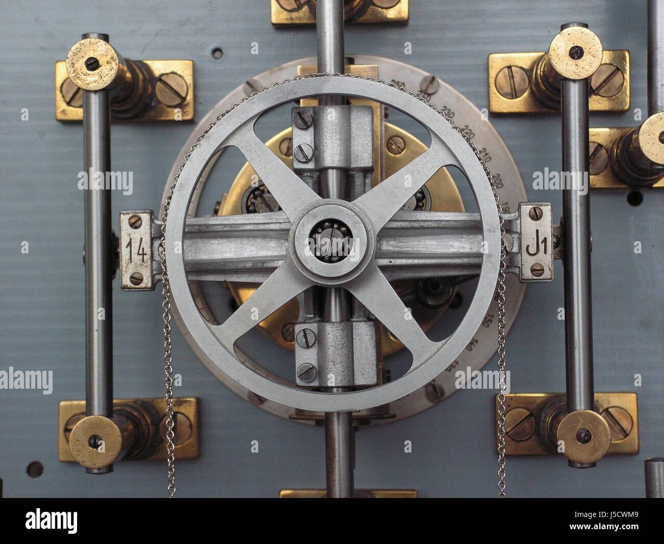 wheel chain iron screws brass scale spokes degree redirection ball bearing Stock Photo