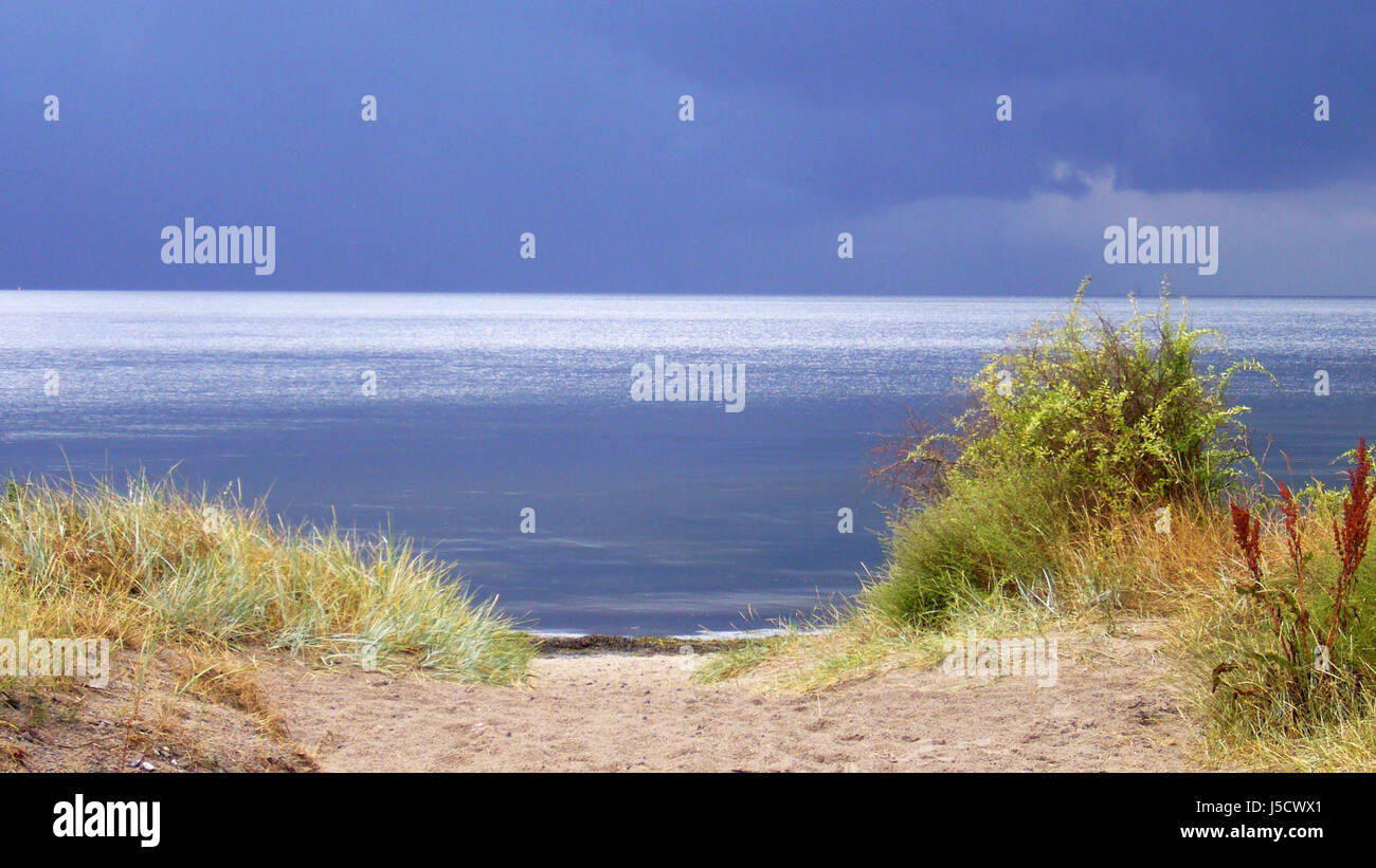 blue shine shines bright lucent light serene luminous beach seaside the beach Stock Photo