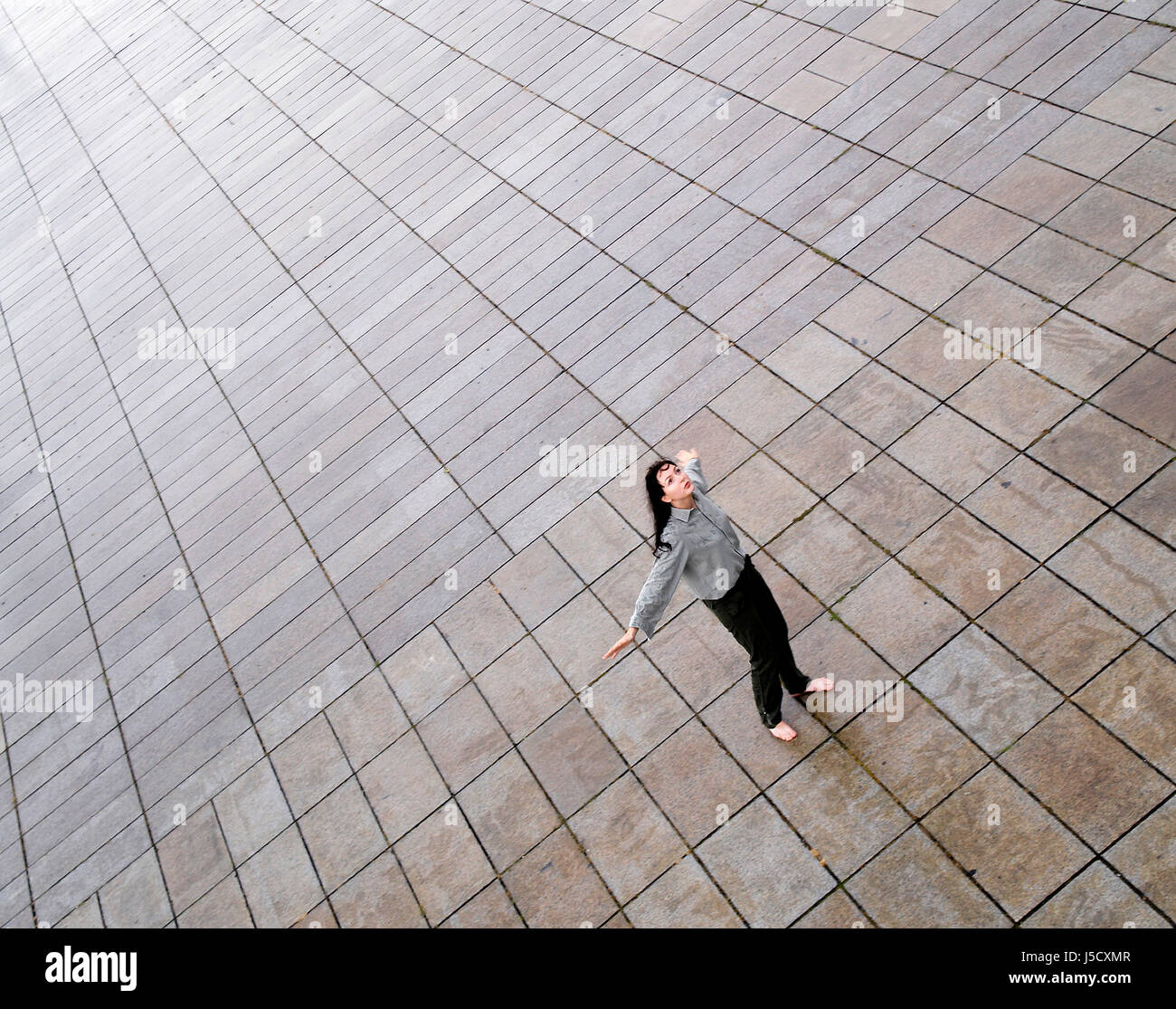 woman green room lost longing plaster freedom liberty perspective prospect Stock Photo