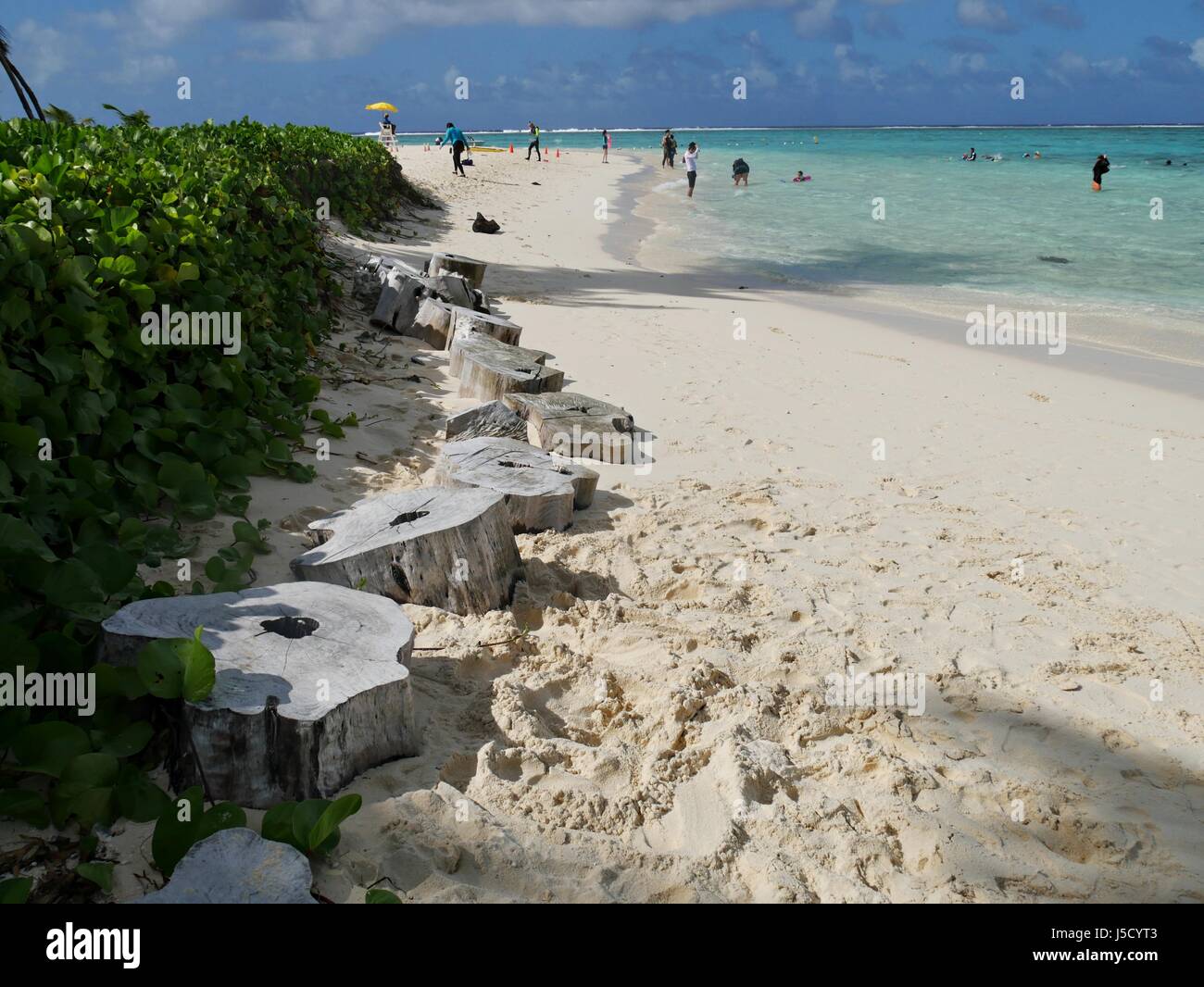 Saipan, USA- October 2016: Tourists and locals continue to patronize Managaha Island for its soft, sandy beaches and crystal clear waters. Stock Photo