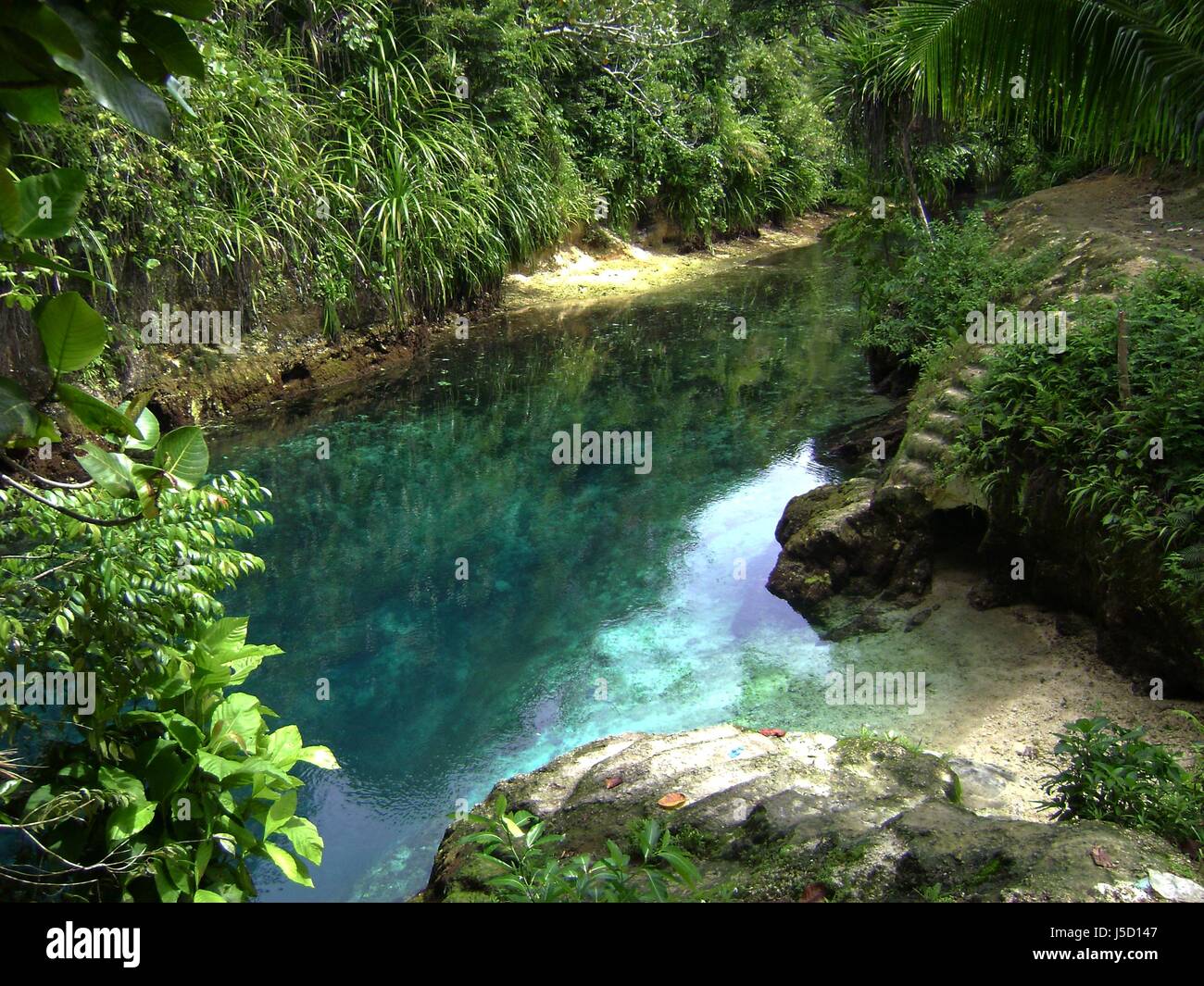 Enchanted River, Hinatuan, Surigao del Sur Philippines The Enchanted River in Hinatuan, is one of the must-visit places in Mindanao, Philippines. Stock Photo