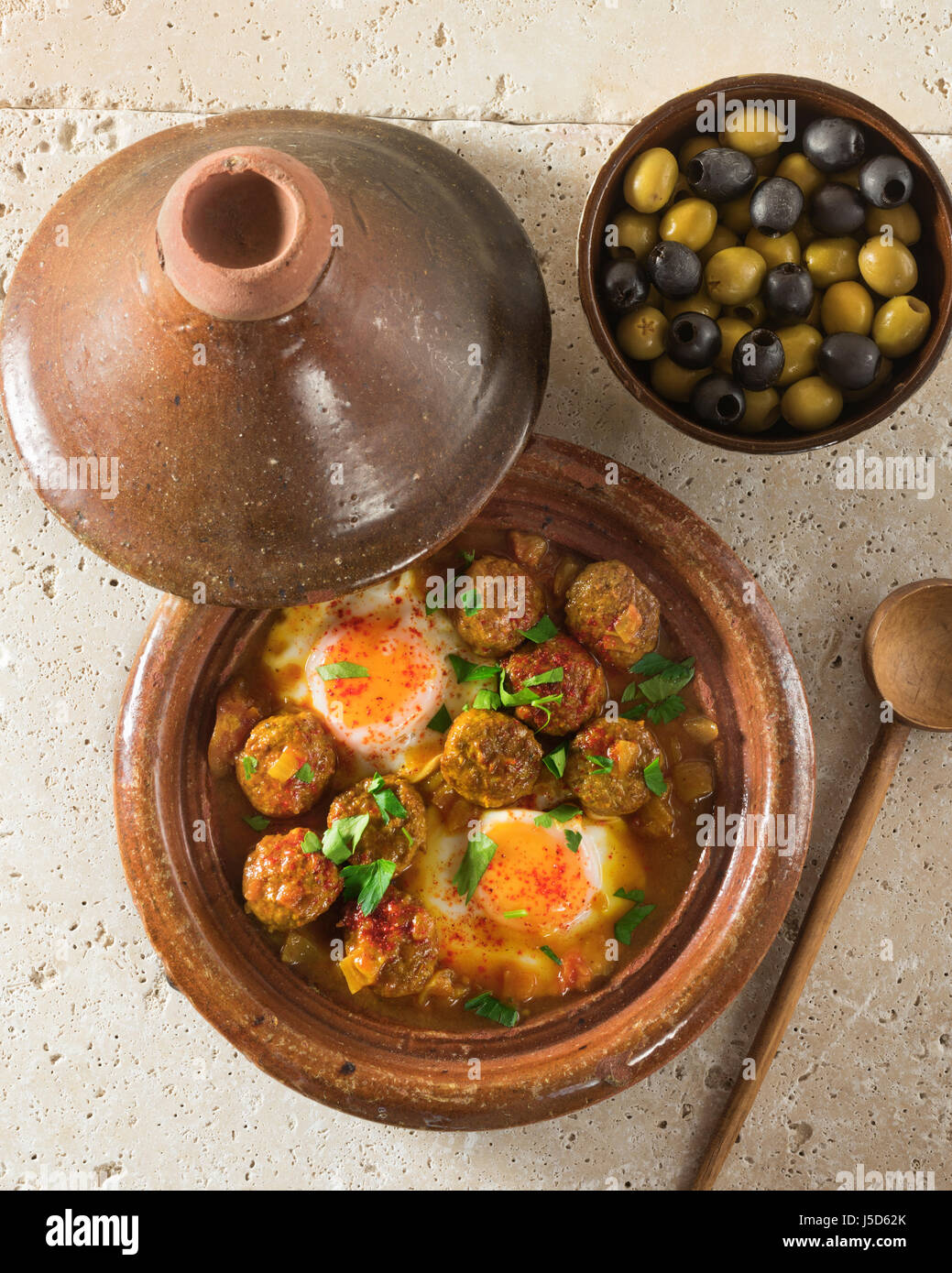 Kefta tagine. Spicy meatballs with eggs. Morocco Food Stock Photo