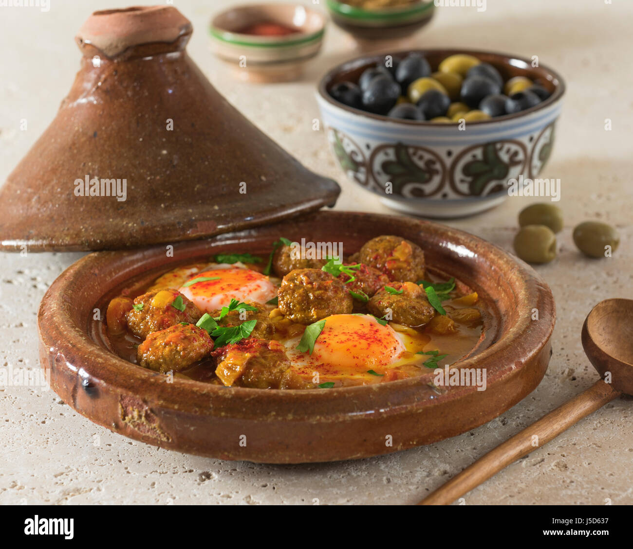 Kefta tagine. Spicy meatballs with eggs. Morocco Food Stock Photo