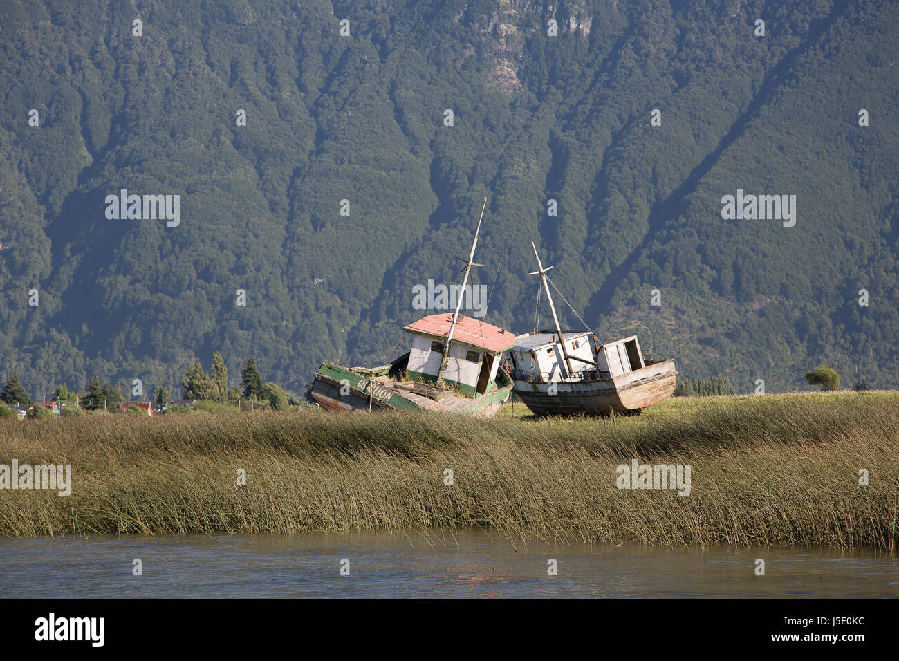 Forgotten boats on the shore Stock Photo