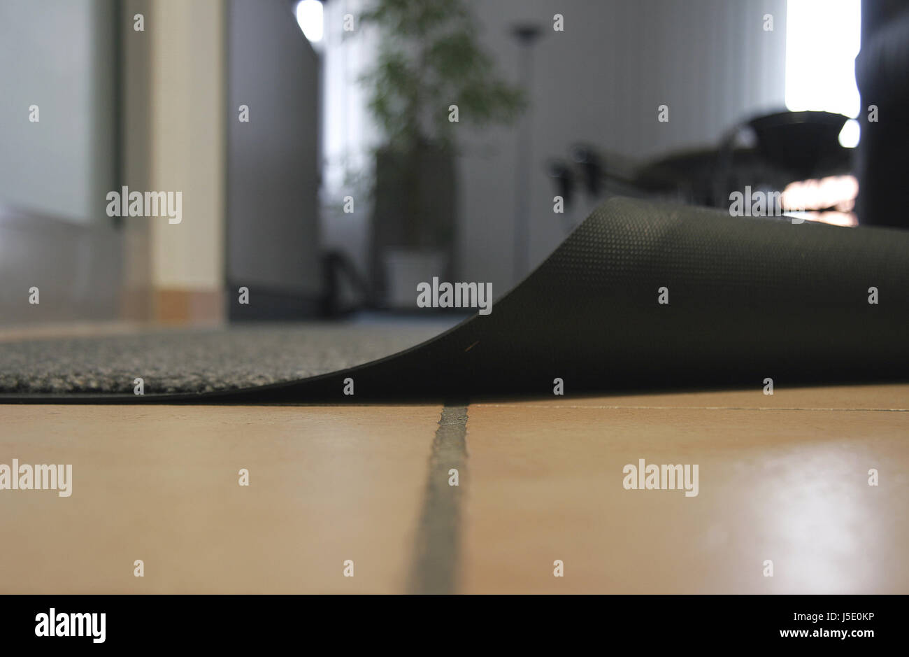 swept under the carpet Stock Photo Alamy