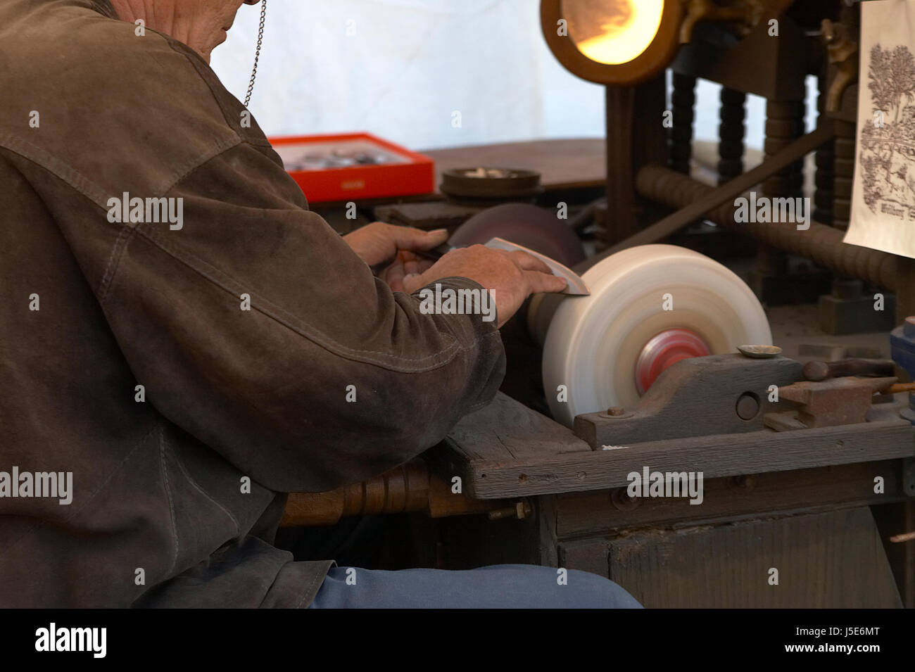 hand hands grind grinding machine polisher work job labor business