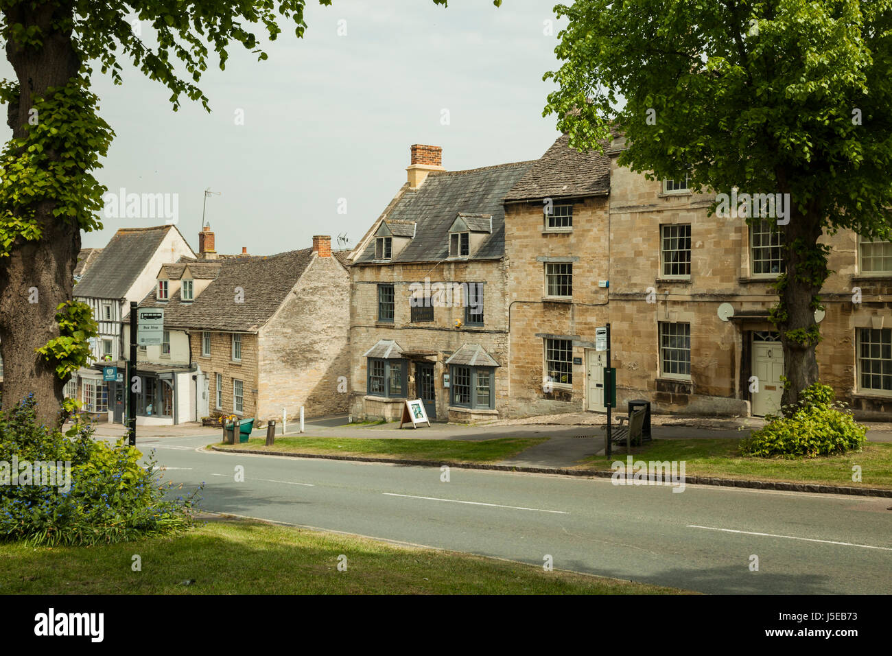 Spring day in the medieval Cotswold town of Burford, Oxfordshire ...