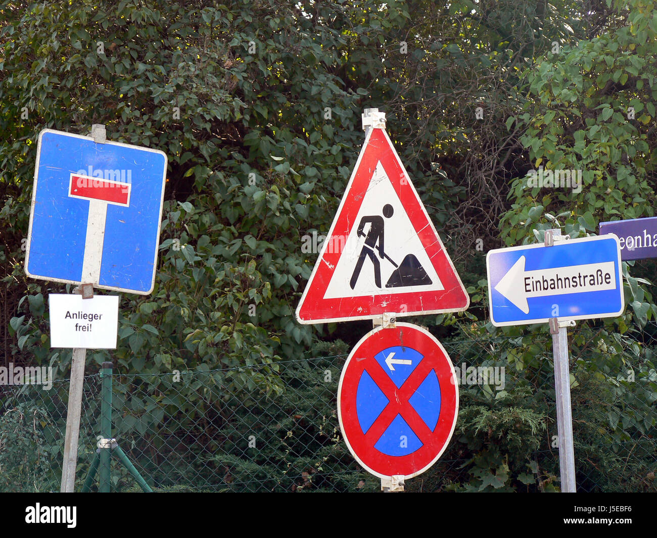 road signs clutter Stock Photo - Alamy
