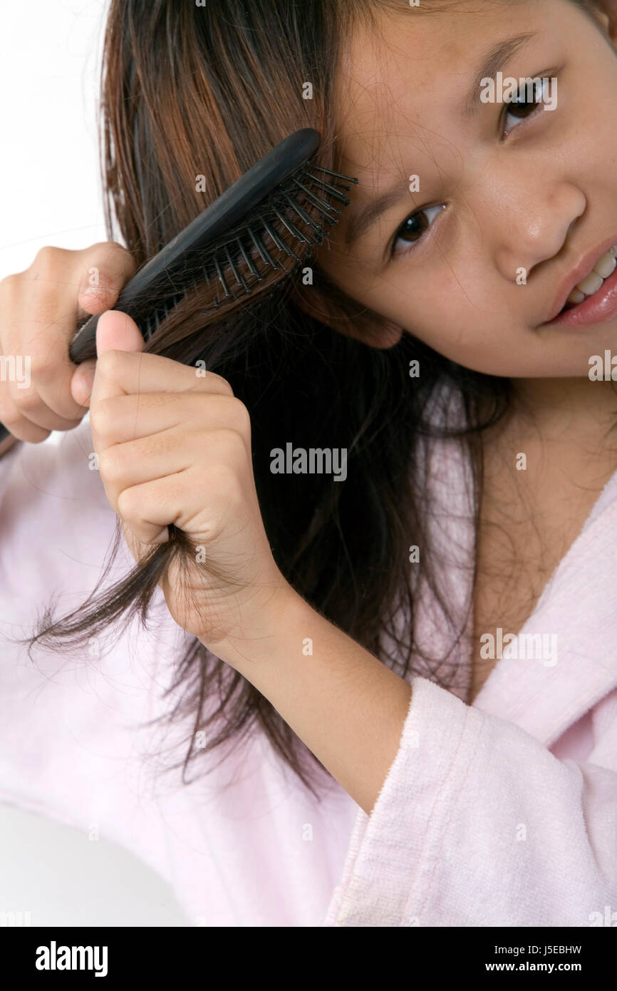 brush girl in hair Stock Photo Alamy