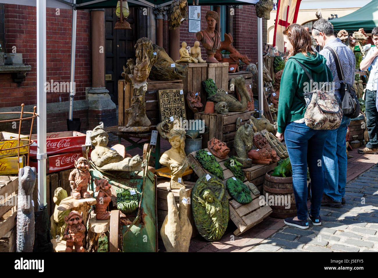 A Couple Looking At Garden Ornaments, Street Market, Lewes, East Sussex, UK Stock Photo