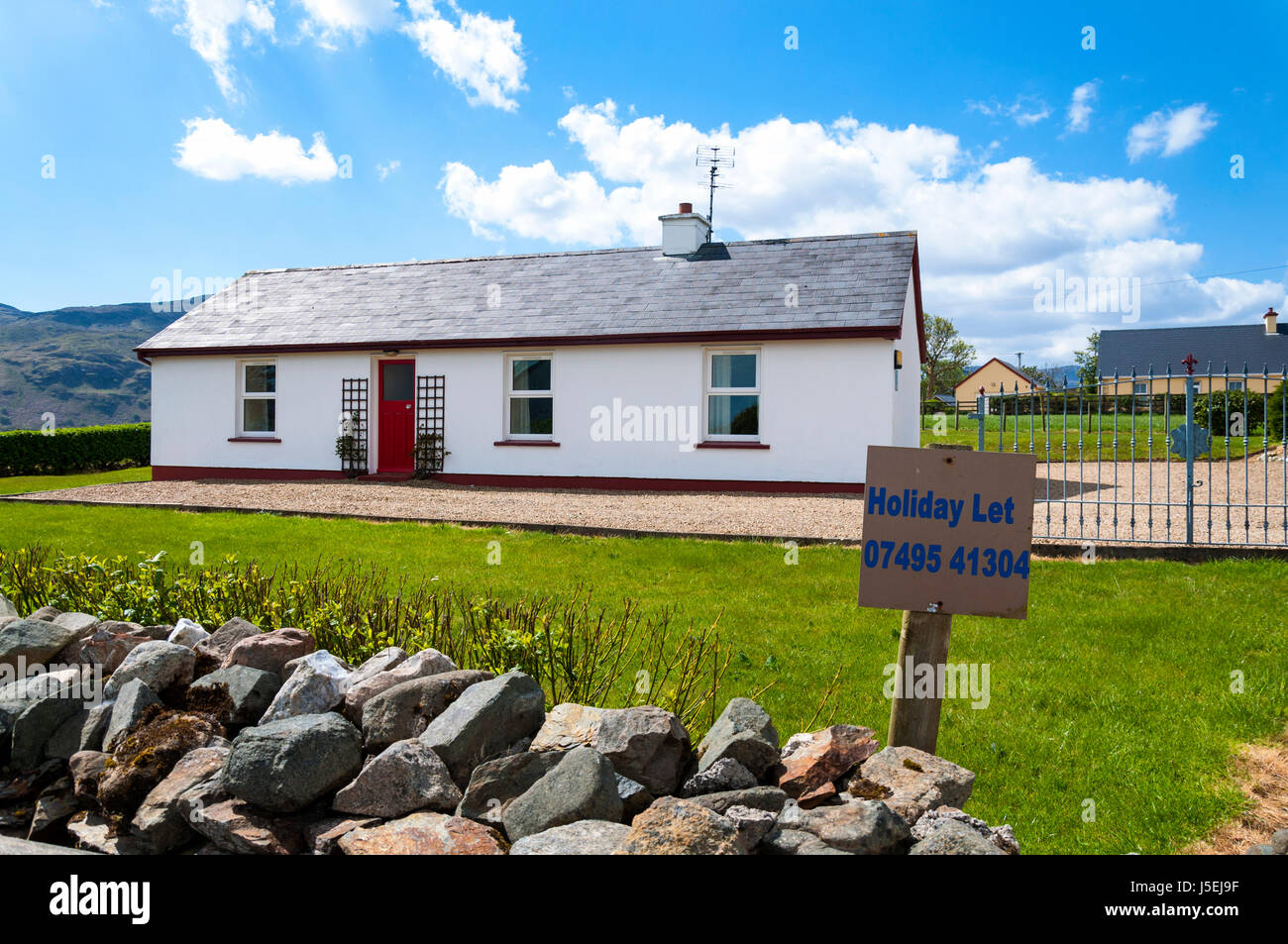 Holiday cottage to let sign, Loughros Point, Ardara, County Donegal, Ireland Stock Photo