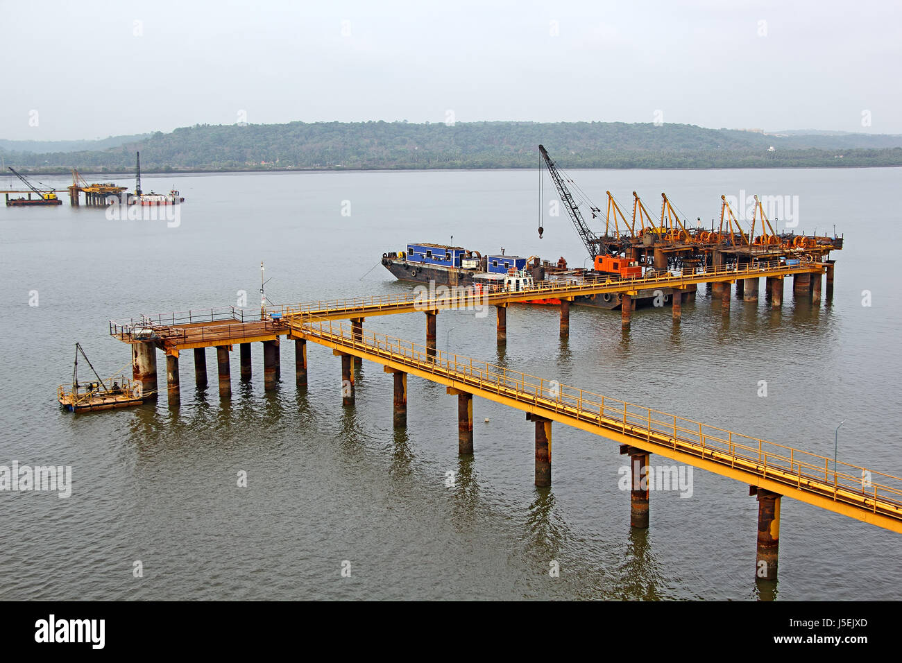 Foundation work for marine structure in full swing in Zuari River in Goa, India Stock Photo