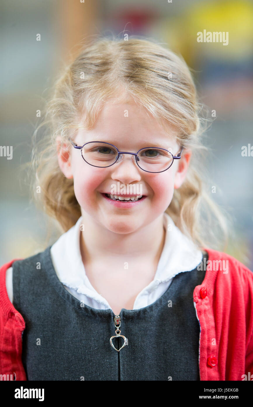 Portrait of a little girl at school Stock Photo - Alamy