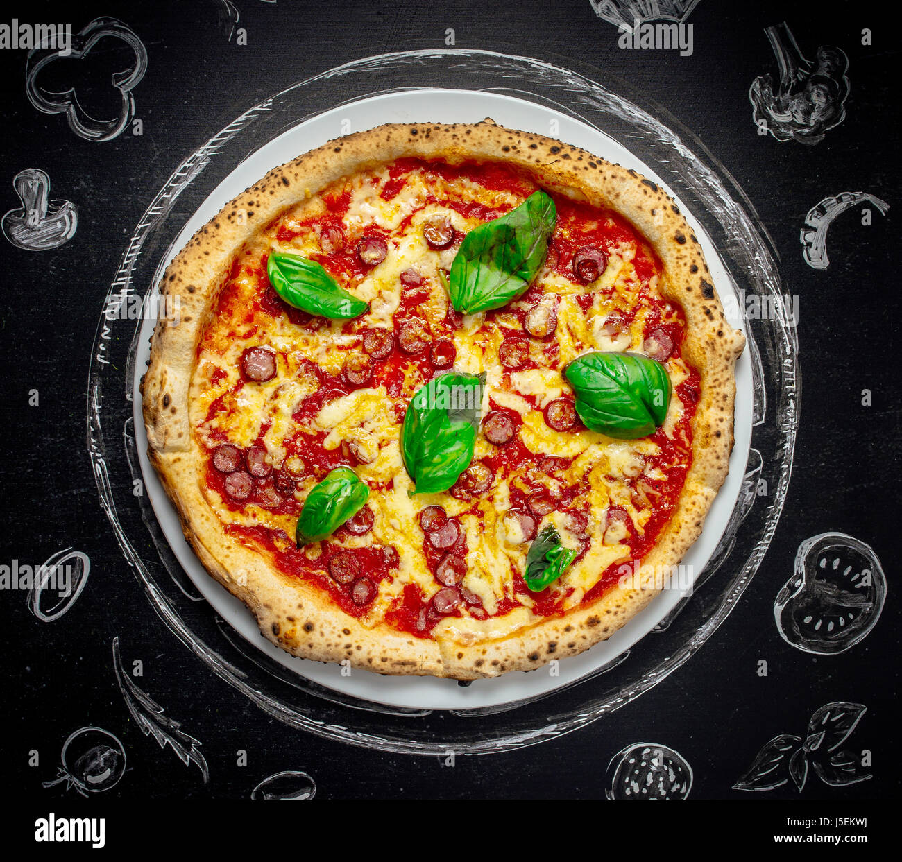 tasty Italian pizza with basil Stock Photo Alamy