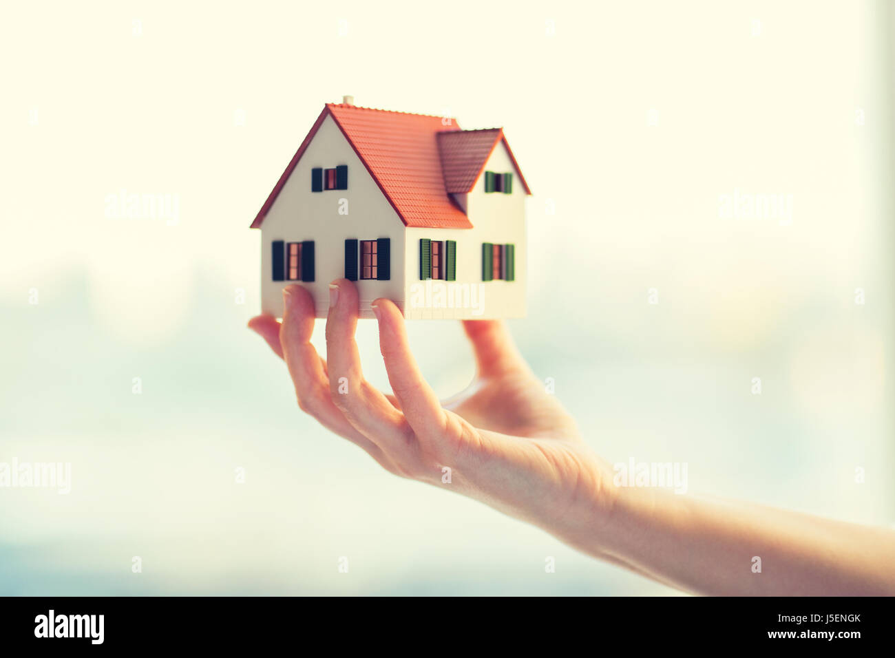 Close Up Of Hands Holding House Or Home Model Stock Photo - Download Image  Now - House, Holding, Home Ownership - iStock