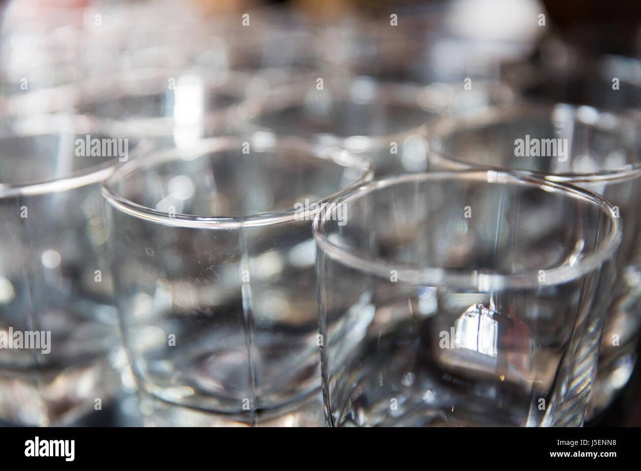 empty old-fashioned glasses at bar Stock Photo