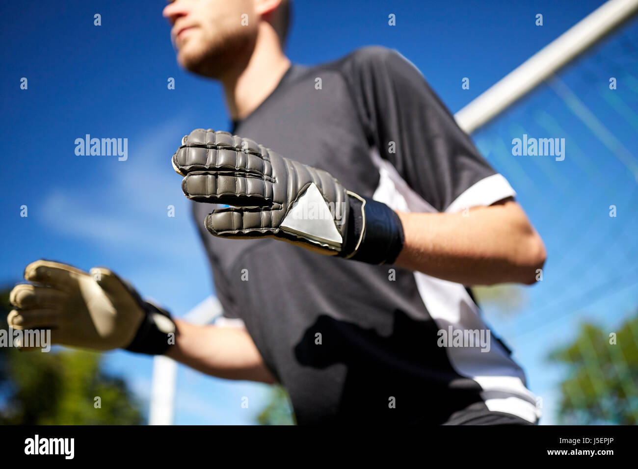 goalkeeper or soccer player at football goal Stock Photo