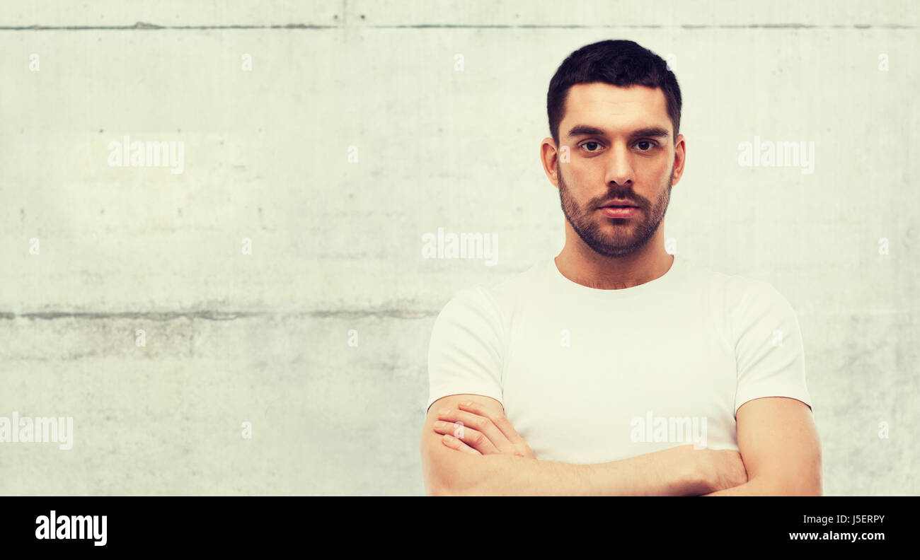 Cool man crossed arms hi-res stock photography and images - Alamy