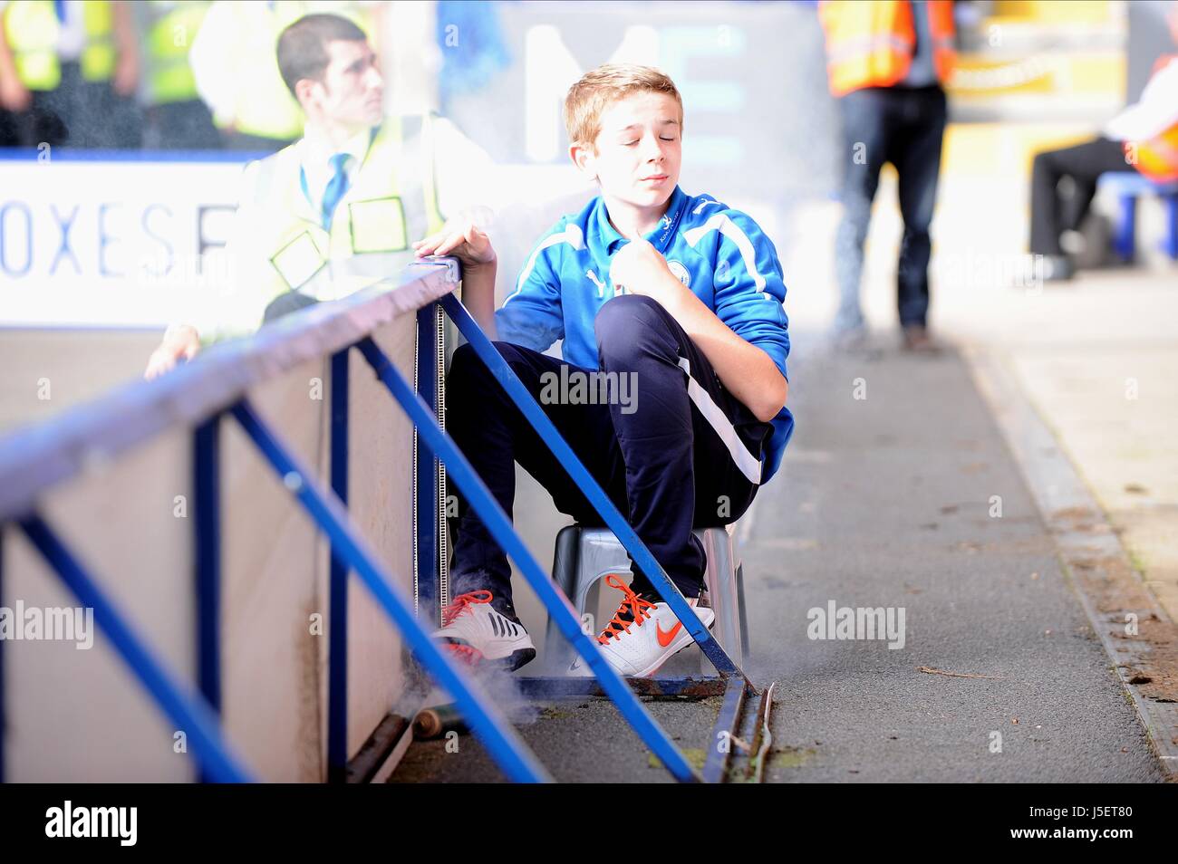 FLARE THROWN BY LEEDS FANS JUS LEICESTER CITY V LEEDS UNITED KING POWER STADIUM LEICESTER ENGLAND 11 August 2013 Stock Photo