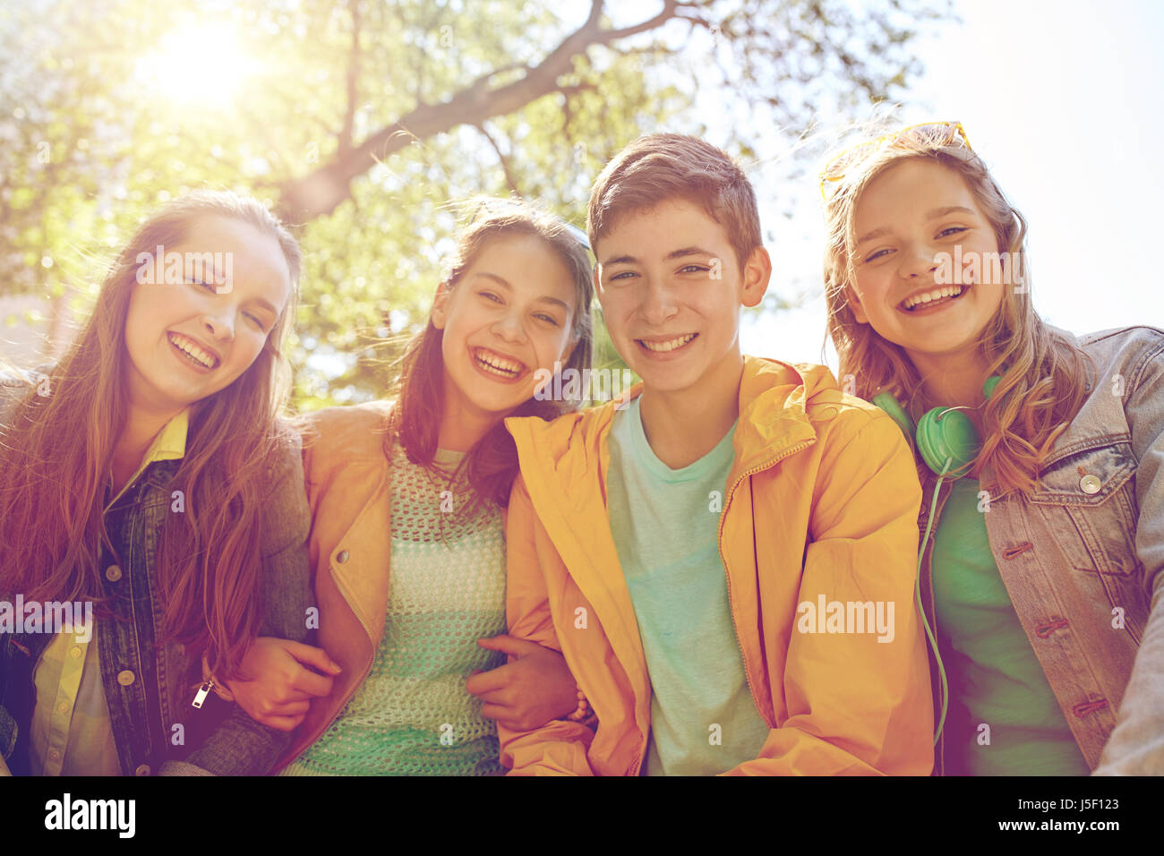 happy teenage students or friends outdoors Stock Photo - Alamy