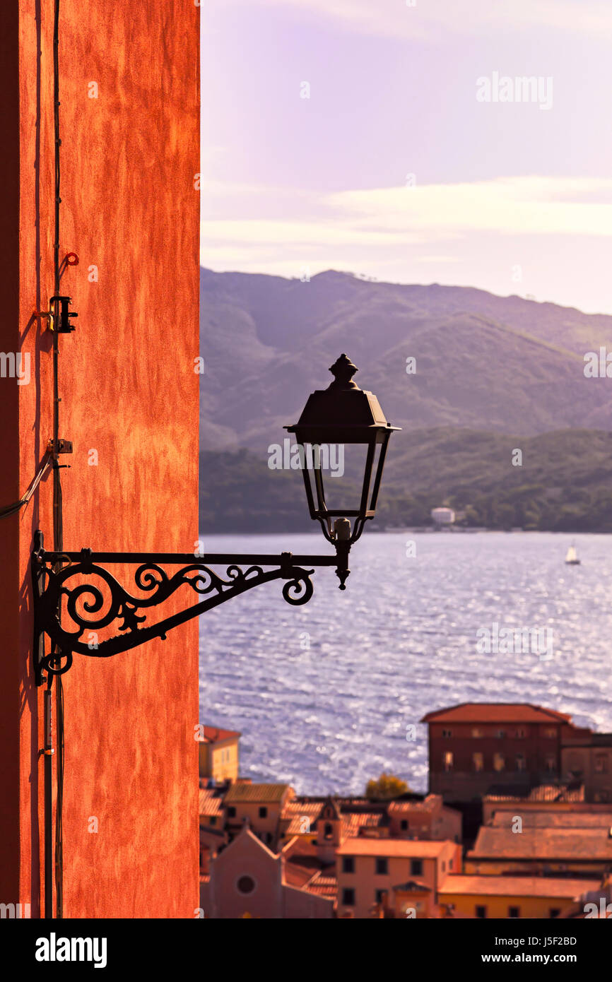 Elba, Portoferraio street lamp view on the sea on sunset. Tuscany, Italy Europe Stock Photo