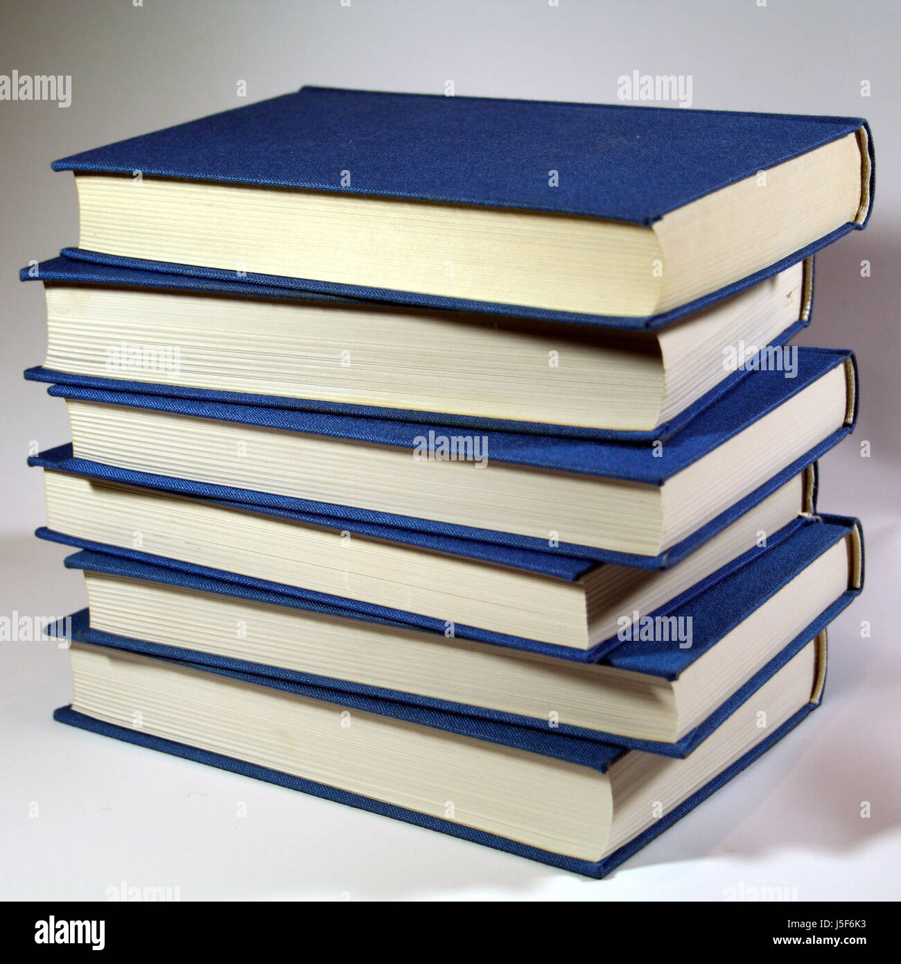 books stack bound tied library stacked browse reading world literature read Stock Photo