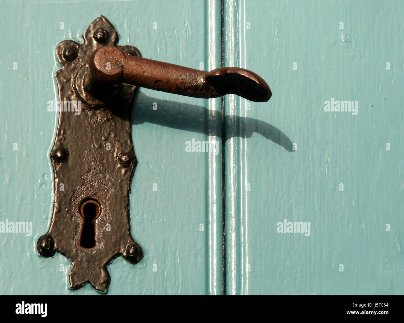 blue nostalgia ailing rusty rust nostalgic keyhole church-door old trdrcker Stock Photo