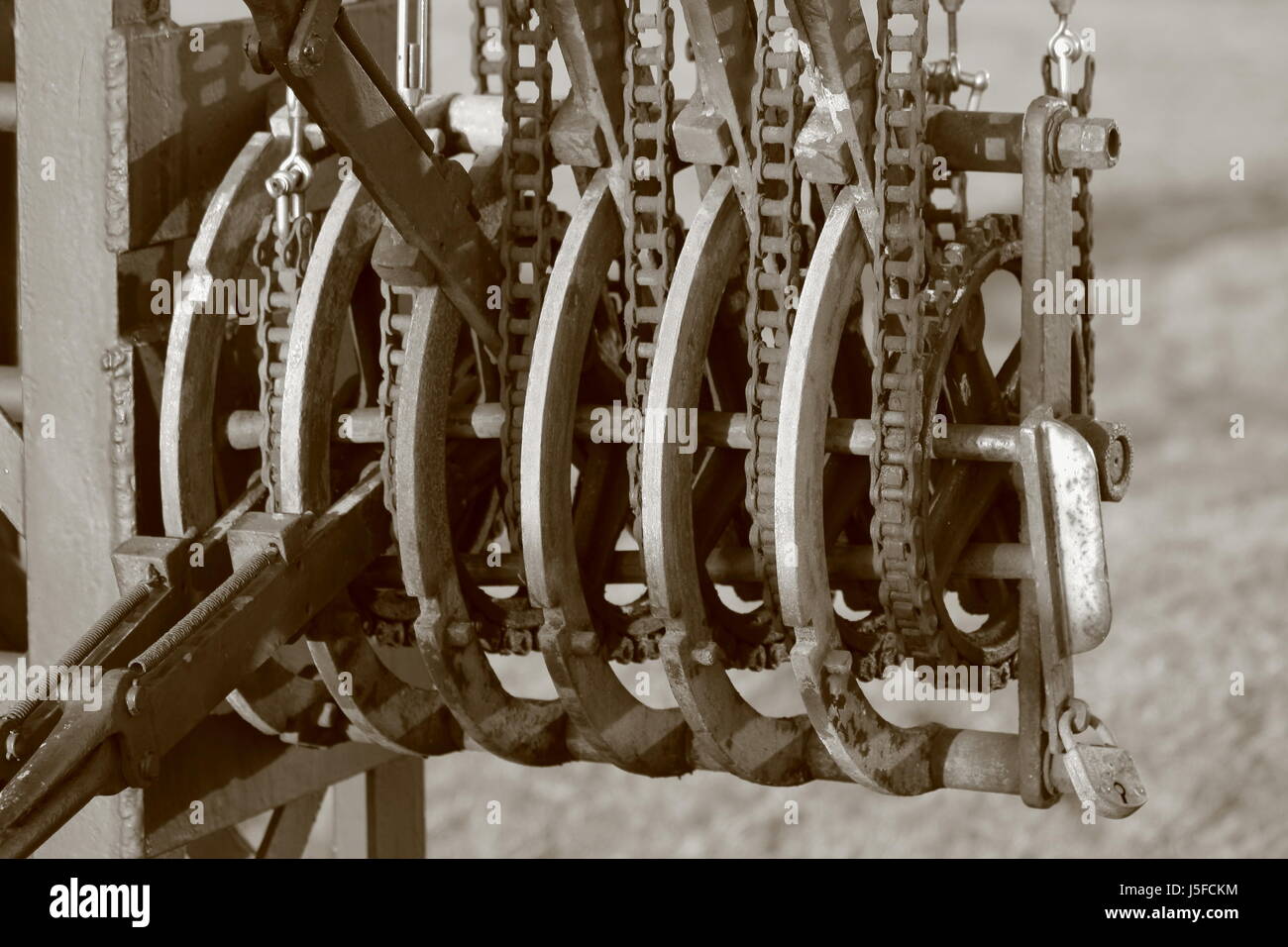 industrialization industry engine drive motor sepia chain gear wheels past Stock Photo