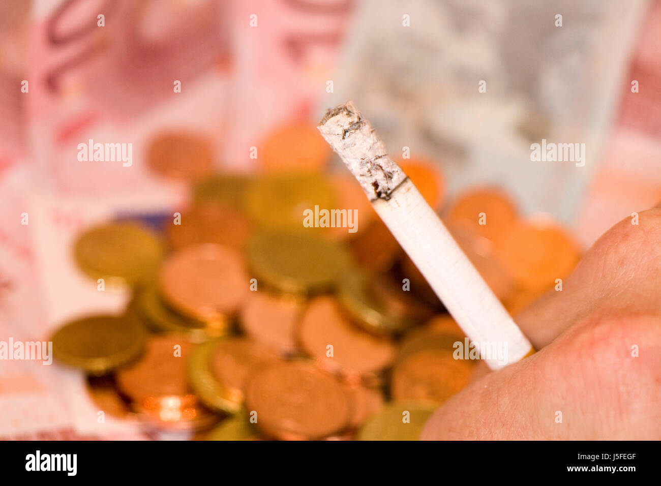 smoking is expensive Stock Photo
