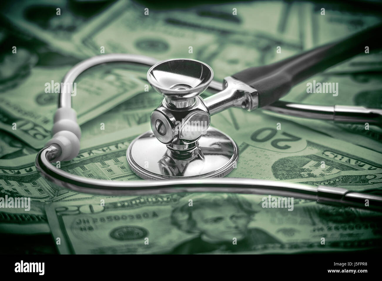 Healthcare cost concept with stethoscope and money Stock Photo Alamy